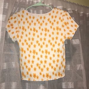 An amazing white body shaping shirt w/ flowers